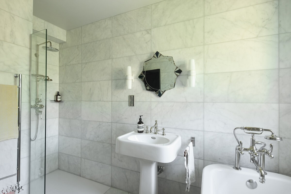 Stained Glass Doors and Terrazzo in a London Home 17 bathroom calacatta marble