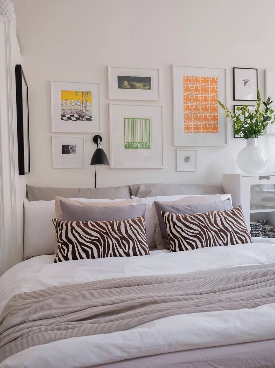 A Small Bright Scandinavian Studio Apartment 6 bed with zebra pillow nordroom