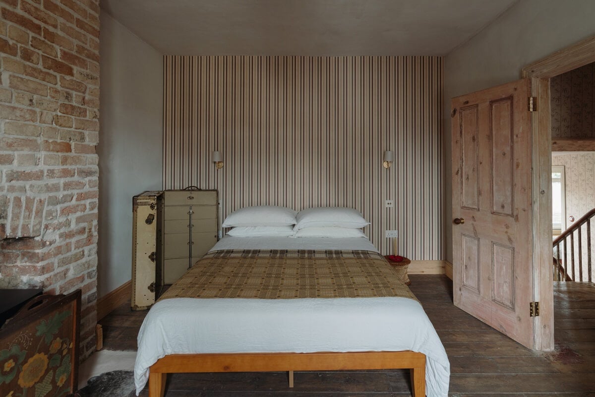 Pared Back Interiors in an English Home in Kent 21 bedroom brick fireplace