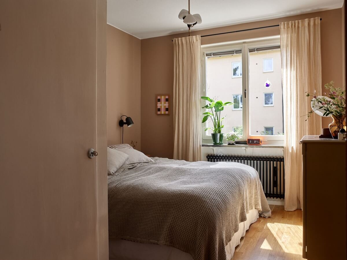 A Charming and Cozy Midcentury Family Apartment in Sweden 19 bedroom natural light
