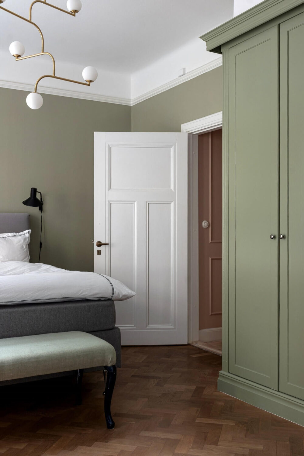 A Classic Apartment with a Blue Living Room 15 bedroom with built in wardrobes
