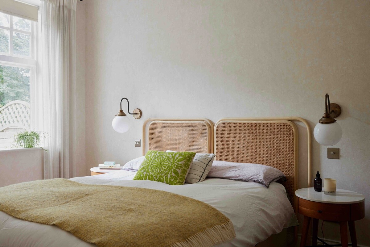 An Apartment with Rich Colors and Modern Design in a Victorian Mansion 10 bedroom with cane headboard
