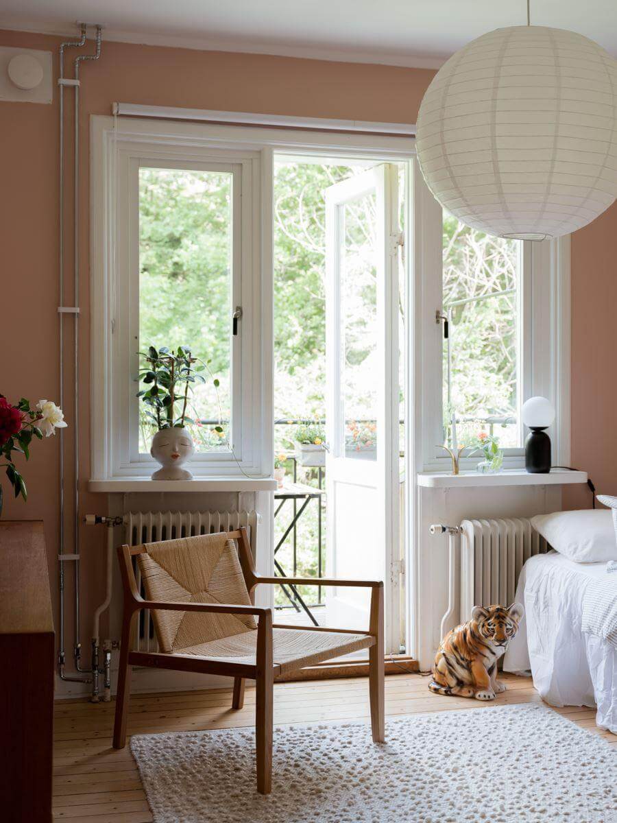 A Beautiful Renovated Maisonette Home with a Calm Color Palette 16 bedroom with light pink walls