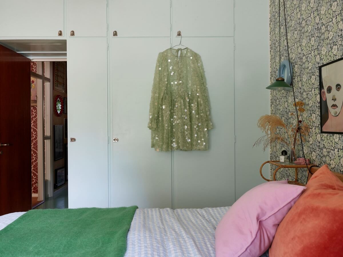 A Colorful Swedish Apartment Inspired by the 50s and 70s 25 bedroom with wallpaper and light blue wardrobes nordroom