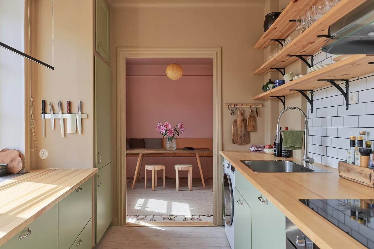 Warm Color-Drenched Rooms in a Swedish Apartment 9 beige kitchen with shelves