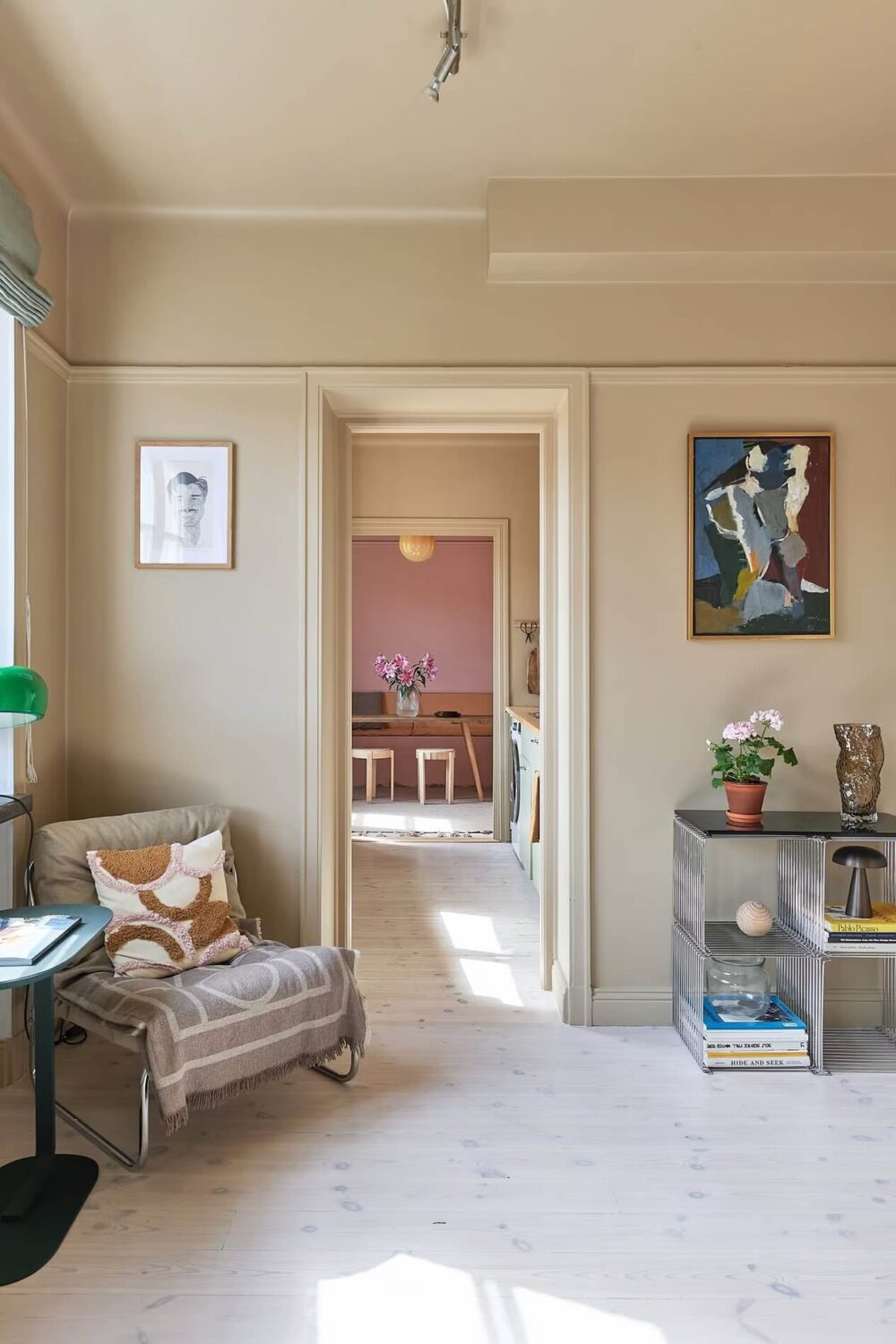 Warm Color-Drenched Rooms in a Swedish Apartment 8 beige siting room with painted ceiling