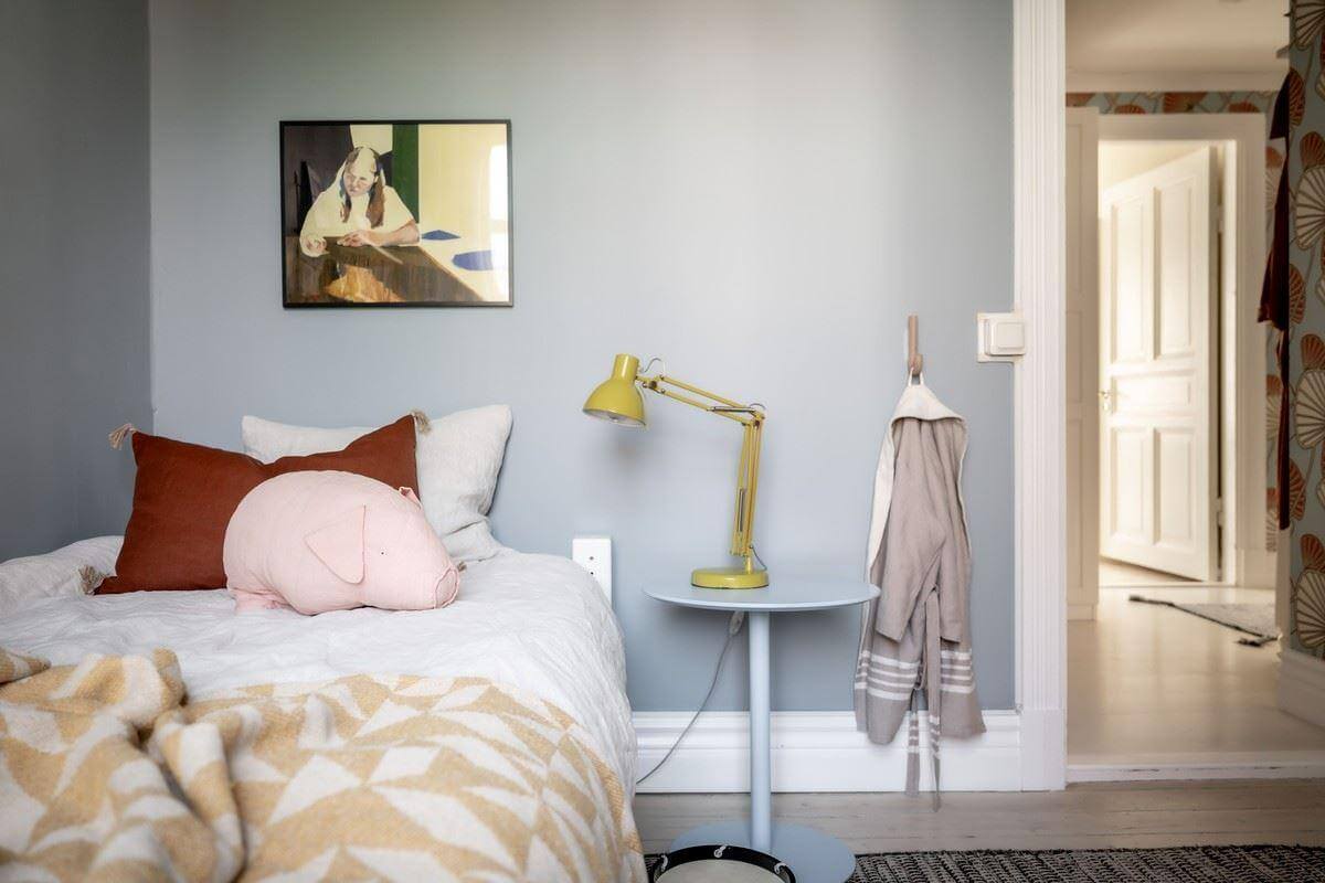 A Bright Swedish Apartment with Subtle Color Accents 23 blue bedroom A Bright Swedish Apartment with Subtle Color Accents