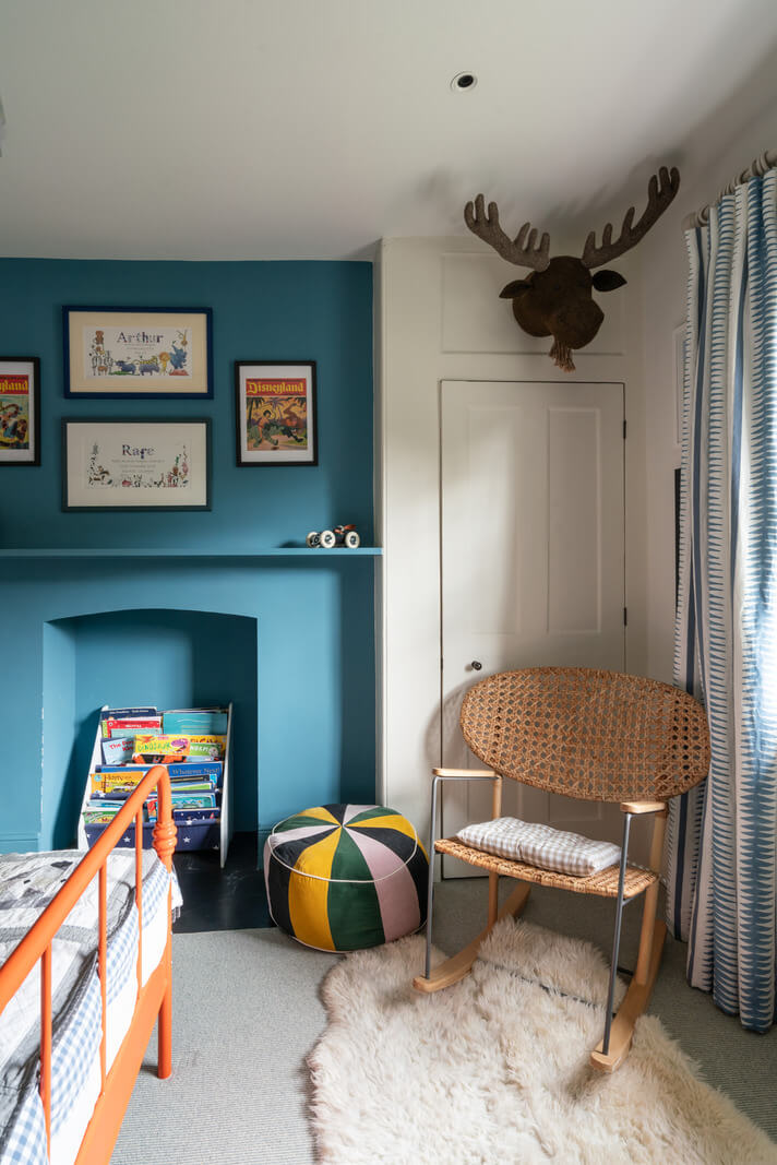 A Beautiful London Family Home with Colorful Accents 23 blue fireplace mantel