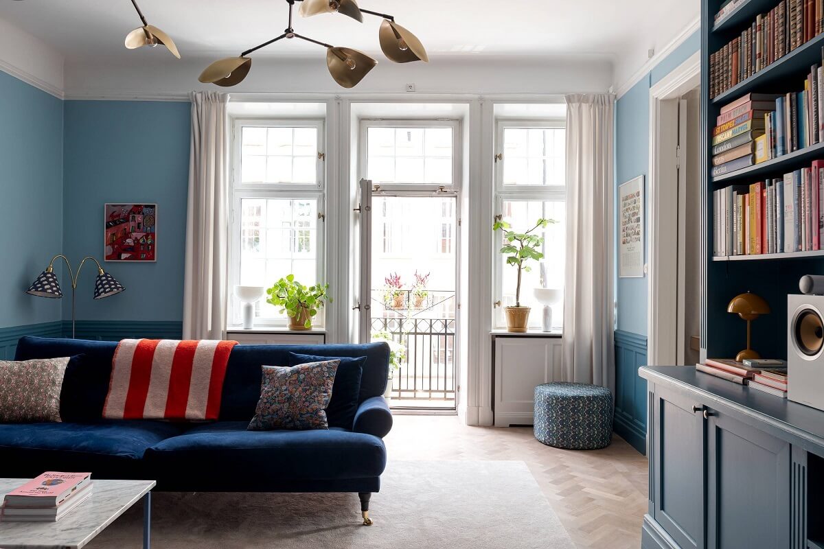 A Classic Apartment with a Blue Living Room 2 blue living room with balcony nordroom