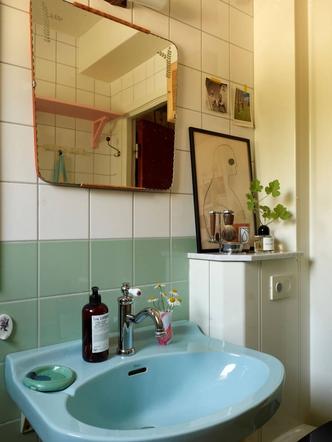 A Colorful Swedish Apartment Inspired by the 50s and 70s 28 blue sink and mint green bathroom tiles nordroom