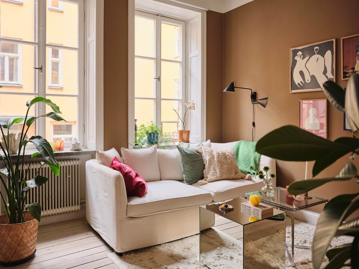 A Small Apartment with Calm Brown, Green, and Yellow Walls 2 brown living room scandi apartment nordroom