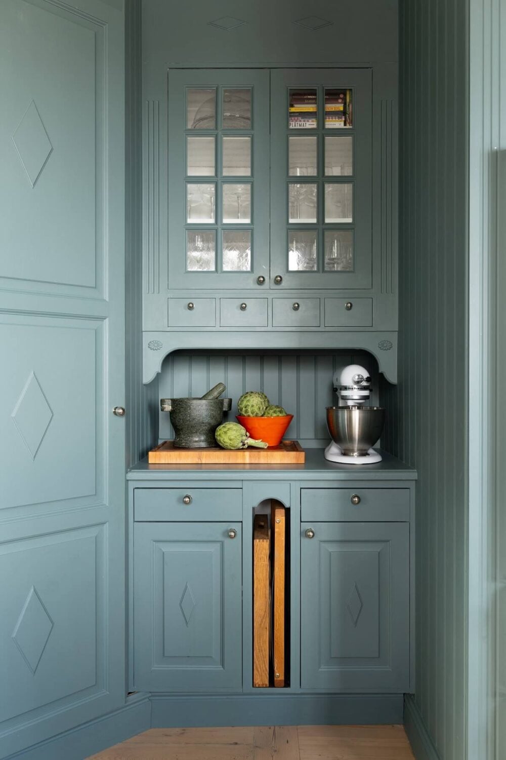 A Yellow Swedish Villa with Views of the Sea 7 built in cabinets kitchen