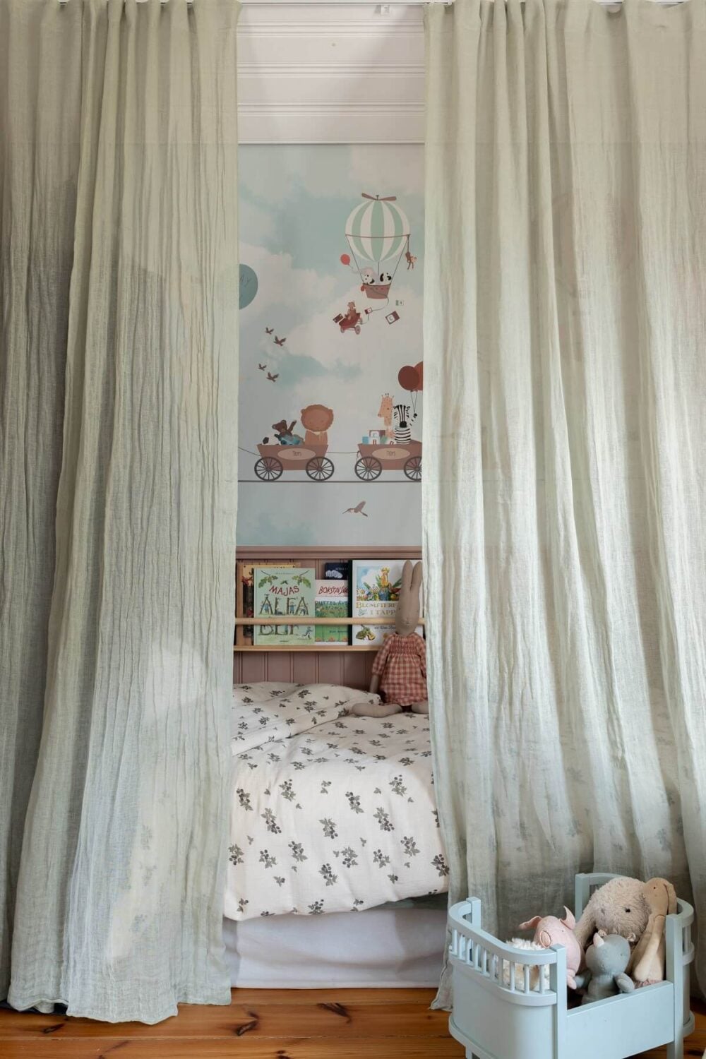 A Yellow Swedish Villa with Views of the Sea 19 childrens bed hidden behind curtains nordroom