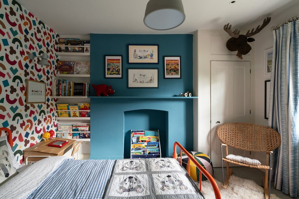 A Beautiful London Family Home with Colorful Accents 22 childrens bedroom with colorful wallpaper and blue feature wall nordroom