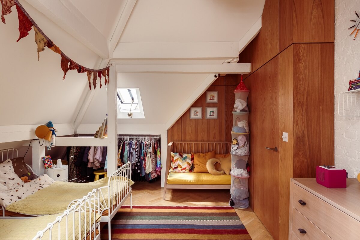 Best of 2024: Children's Bedrooms 9 children's bedroom wooden accent wall slanted ceiling nordroom