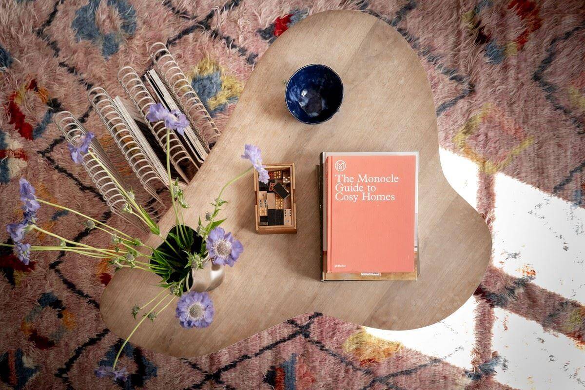 A Bright Swedish Apartment with Subtle Color Accents 4 coffee table and rug detail