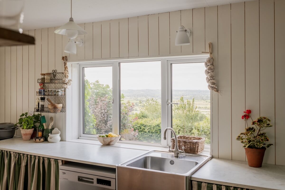 7 Simple Tricks To Make a Low Ceiling Look Taller 14 cottage kitchen with wooden walls