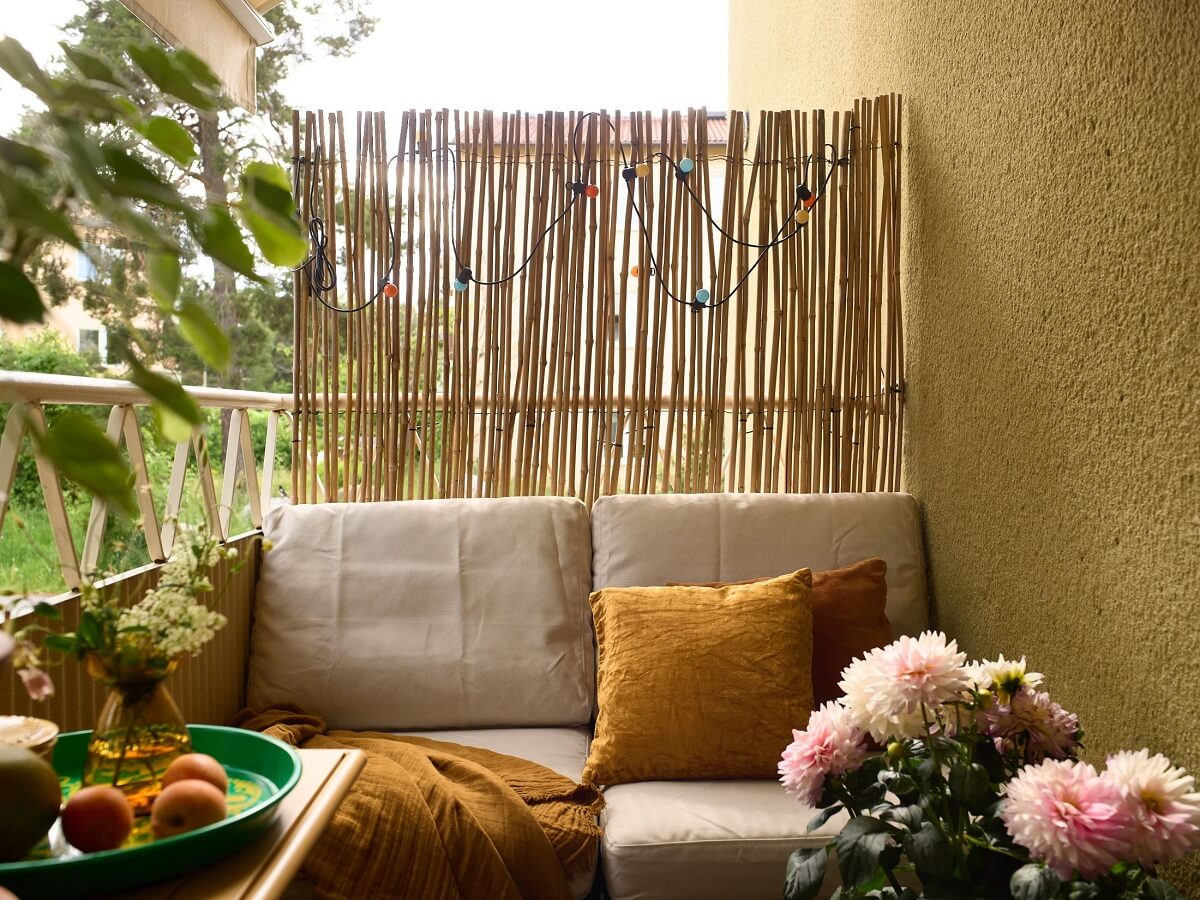 A Charming and Cozy Midcentury Family Apartment in Sweden 10 cozy seating balcony