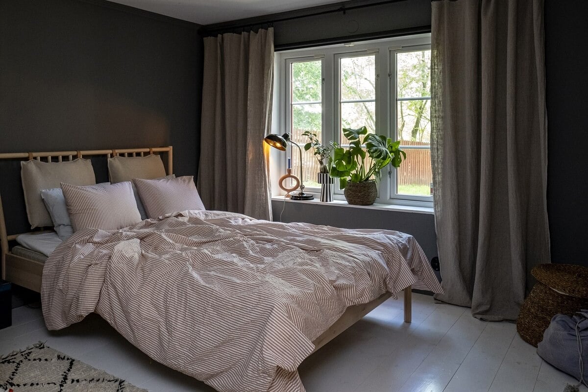 A White Swedish Villa with a Veranda and a Swimming Pool 22 dark gray bedroom nordroom
