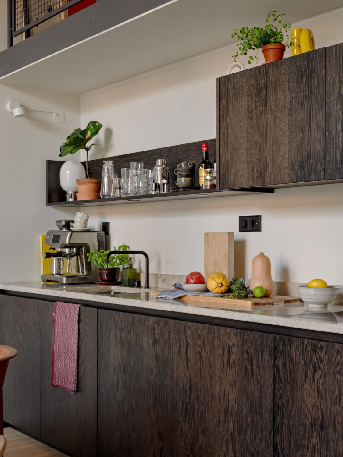 A Monochrome Loft with High Ceilings and Art 28 dark oak kitchen