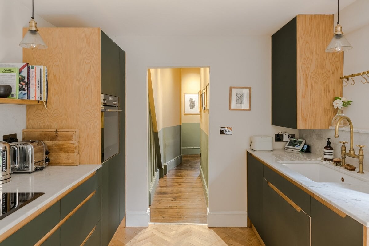 A London Apartment with a Deep Olive Green Kitchen 8 deep olive green kitchen cabinets nordroom