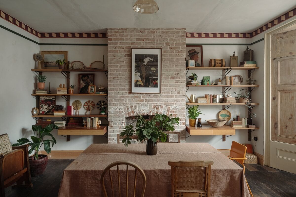 Pared Back Interiors in an English Home in Kent 7 dining room exposed brick shelves nordroom