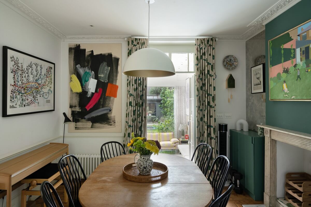 A Beautiful London Family Home with Colorful Accents 9 dining room with fireplace