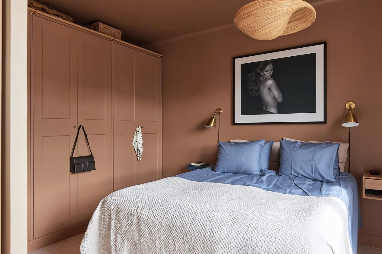 Warm Color-Drenched Rooms in a Swedish Apartment 18 earthy pink bedroom with wardrobes painted in the same color