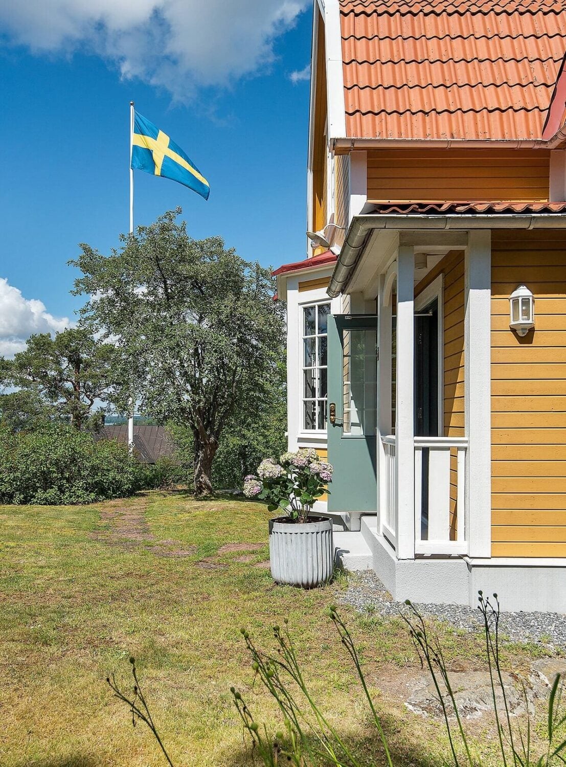 A Yellow Swedish Villa with Views of the Sea 25 exterior yellow swedish villa