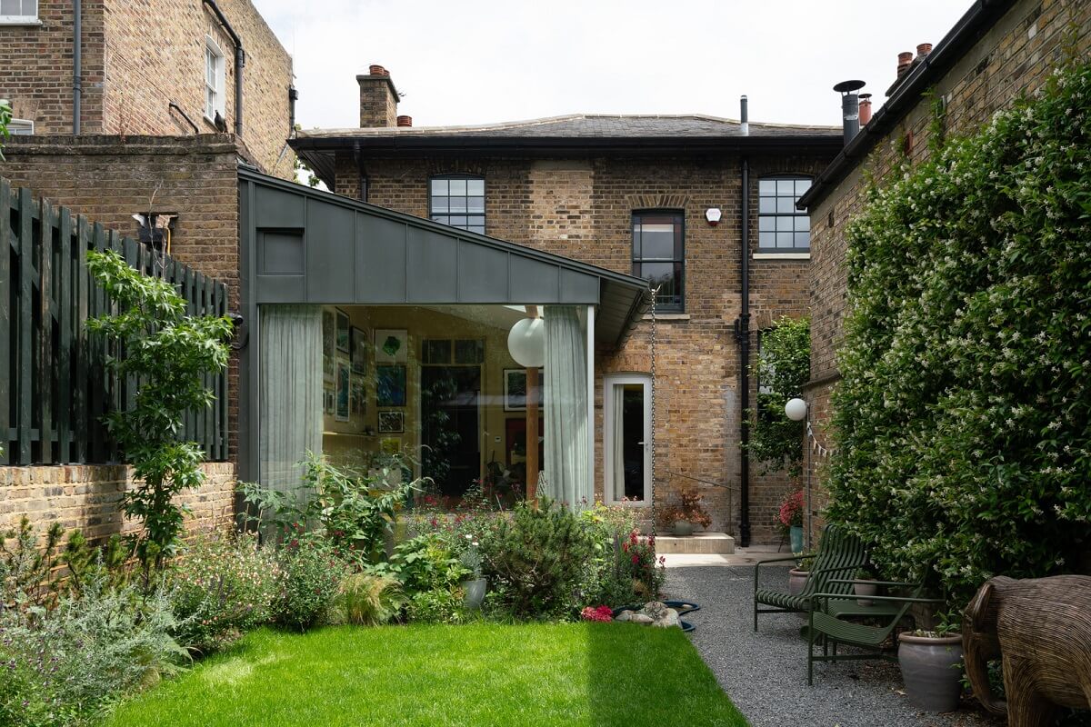 A Beautiful London Family Home with Colorful Accents 27 garden historic house england with modern extension