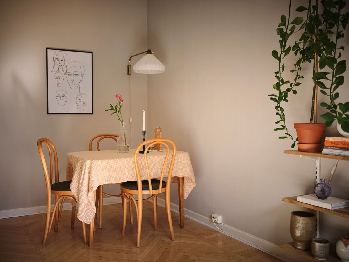 Muted Gray, Green, and Yellow Walls in a Stockholm Apartment 7 gray living room with dining table