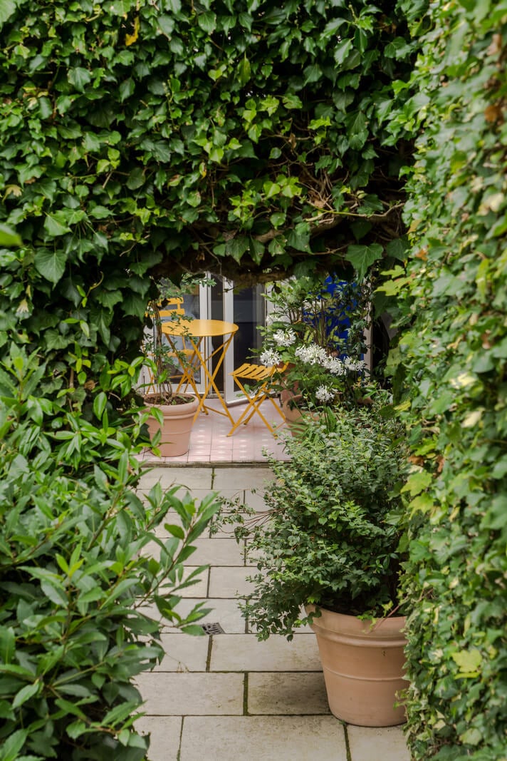 A London Apartment with a Deep Olive Green Kitchen 14 green city garden