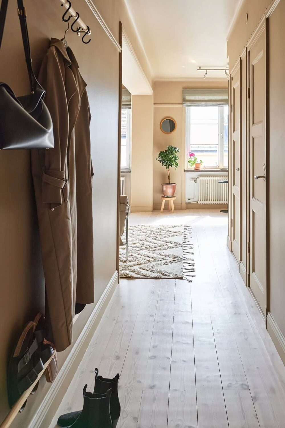 Warm Color-Drenched Rooms in a Swedish Apartment 20 hallway 2 Warm Color-Drenched Rooms in a Swedish Apartment