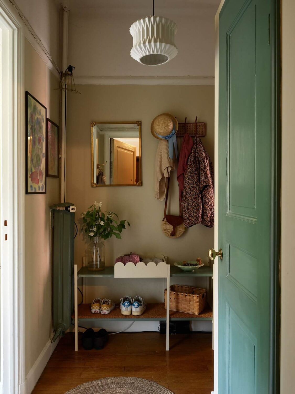 A Cozy 1920s Apartment with Original Details and Wallpaper 31 hallway