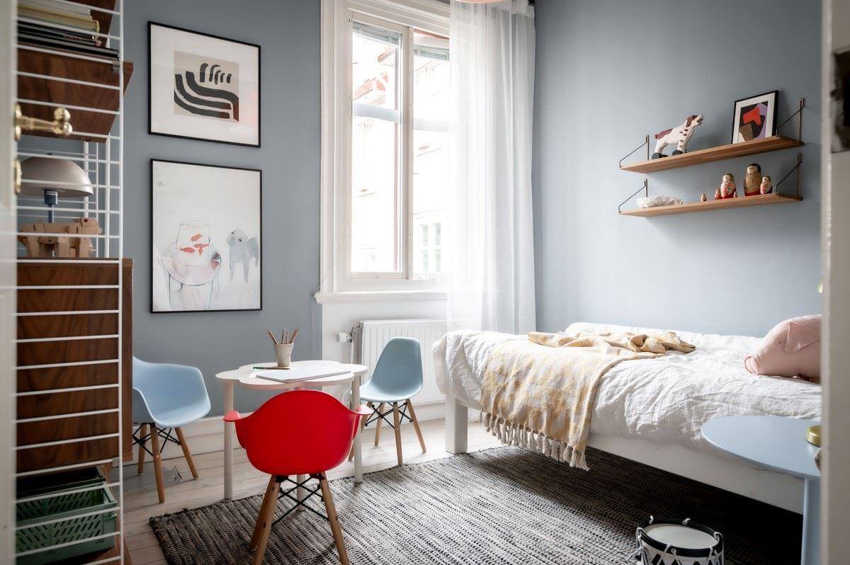 A Bright Swedish Apartment with Subtle Color Accents 21 kids bedroom with blue gray walls