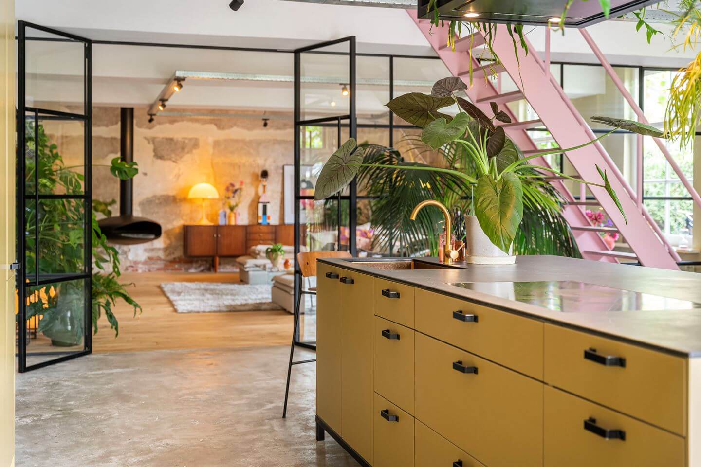 An Old Smokehouse Transformed Into a Modern Industrial Home 14 kitchen island