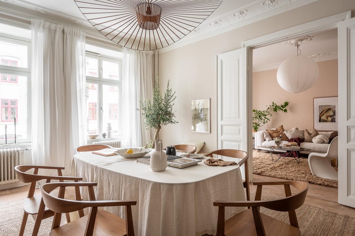 A Spacious Renovated Apartment with a Light Pink Living Room 15 kitchen table