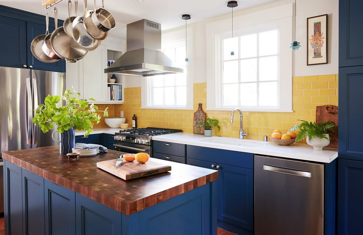 Valspar Color of the Year 2025: Encore 14 kitchen with blue cabinets and yellow tiles