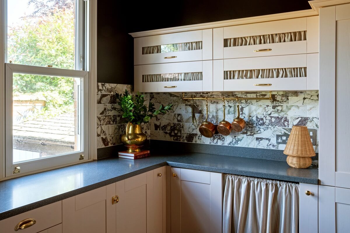 A Beautiful Edwardian House with Period Features 9 kitchen with pink cabinets and black walls