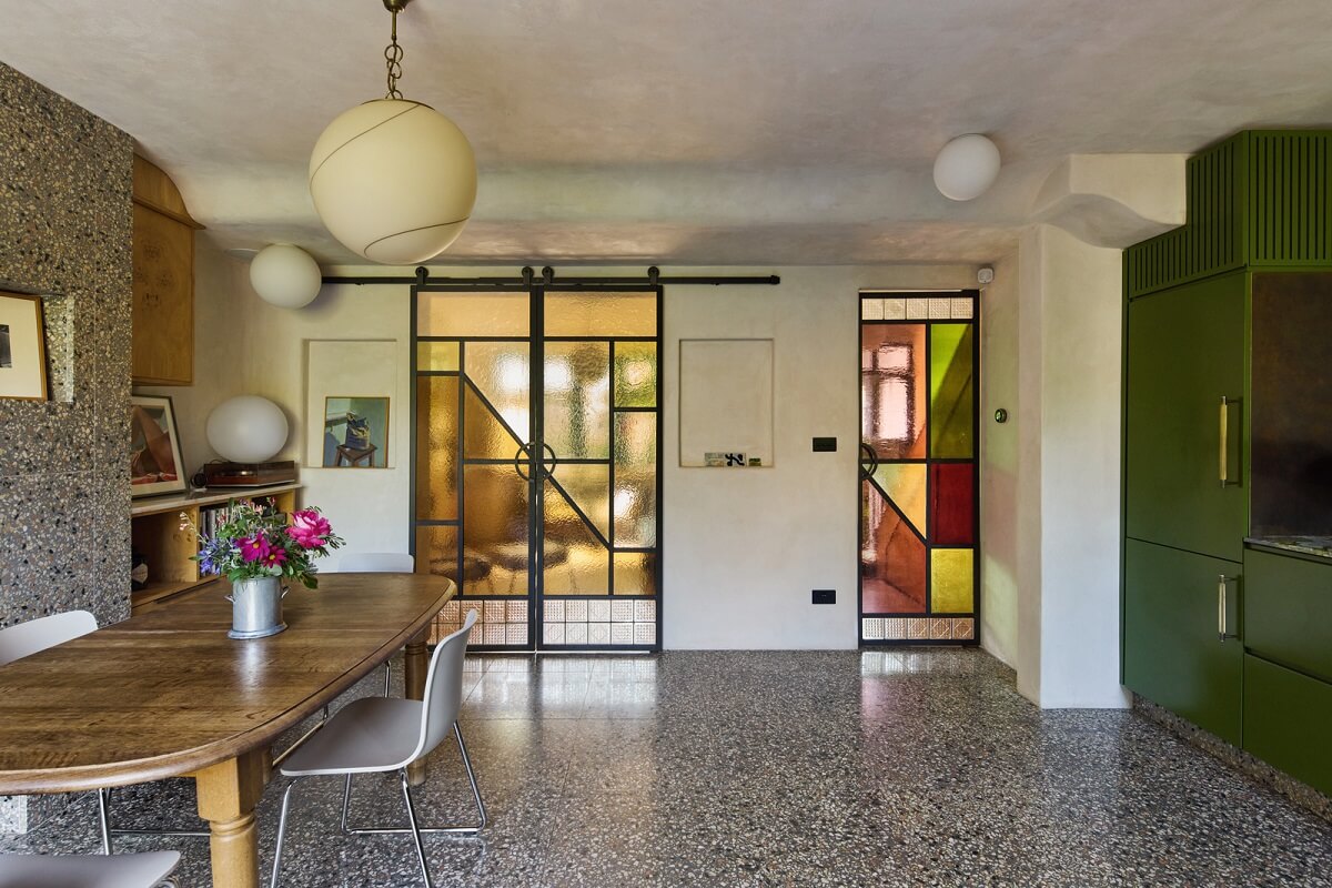 Stained Glass Doors and Terrazzo in a London Home 5 kitchen with terrazzo floor and steel stained glass doors nordroom