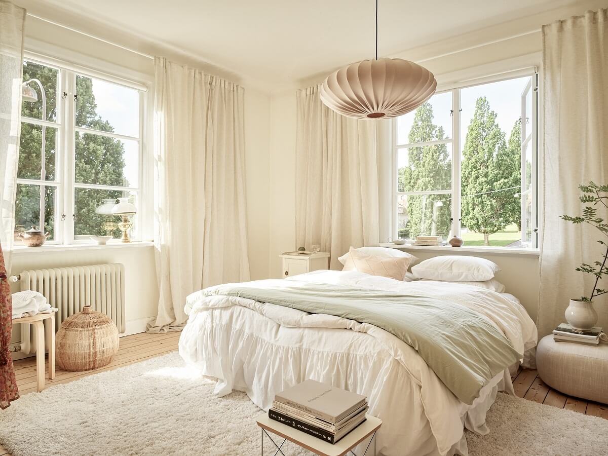 A Light Swedish Apartment with a Charming Kitchen 13 light bedroom with light green color accent nordroom