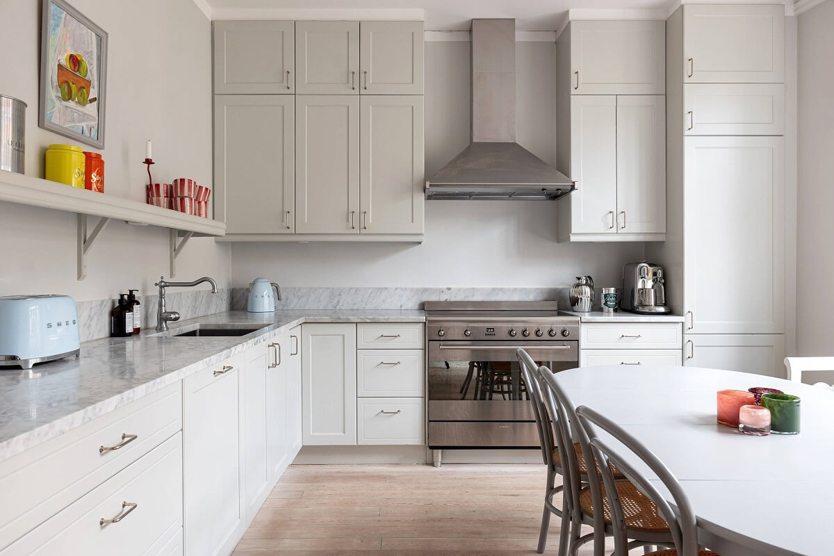 A Classic Apartment with a Blue Living Room 16 light classic kitchen with shelf