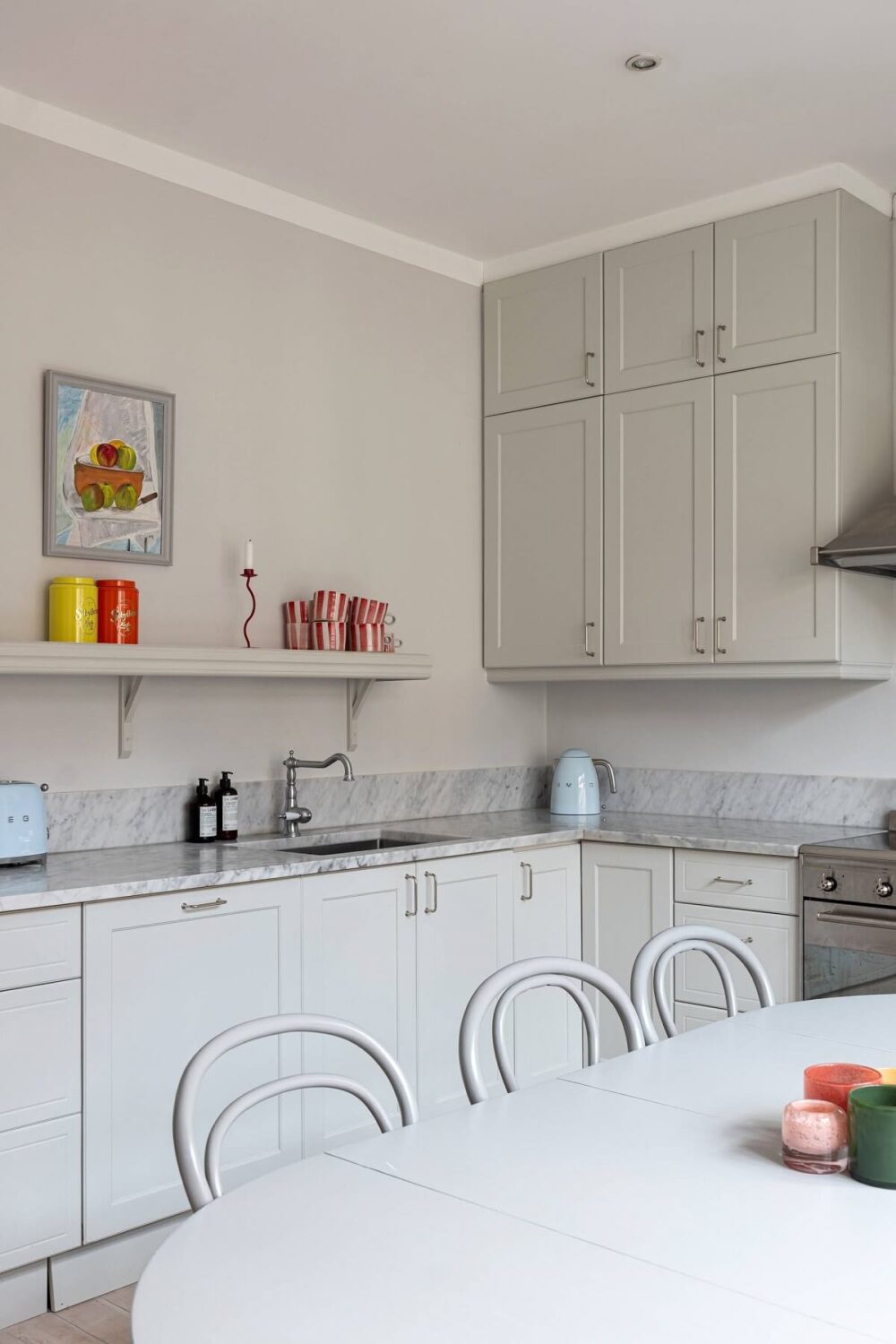 A Classic Apartment with a Blue Living Room 20 light classic style kitchen with shelf
