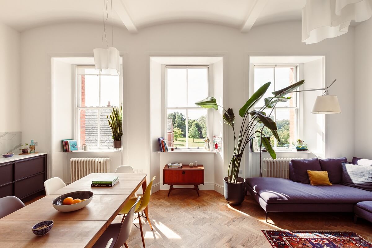 A London Duplex Apartment with a Purple Kitchen 1 light living room arched ceiling purple kitchen and sofa nordroom