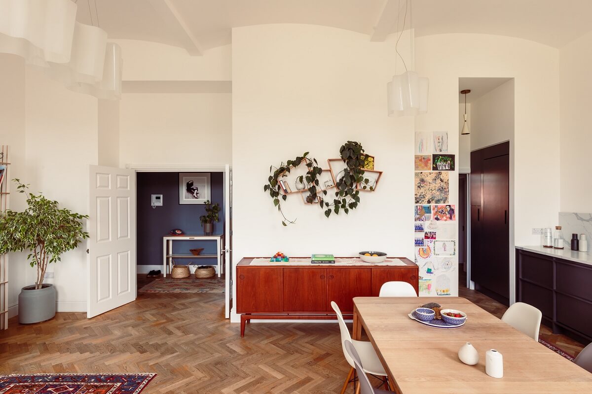 A London Duplex Apartment with a Purple Kitchen 4 light open plan living space with herringbone floor