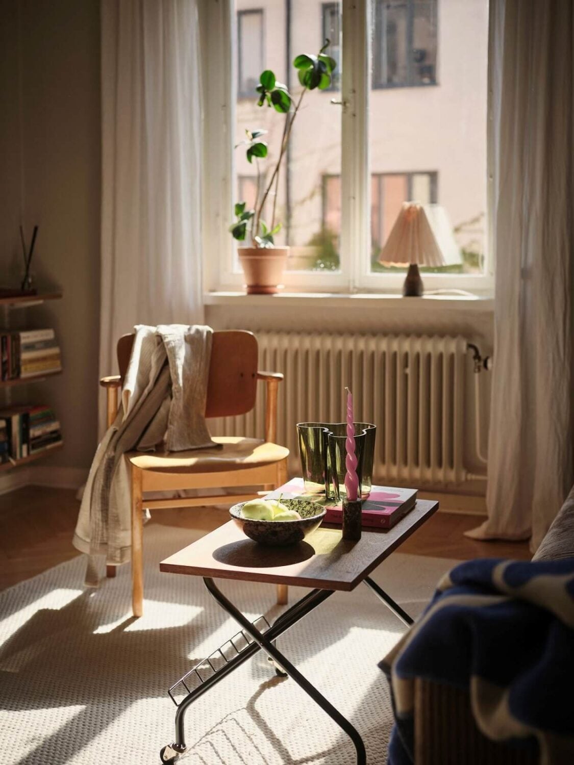 Muted Gray, Green, and Yellow Walls in a Stockholm Apartment 3 living room detail