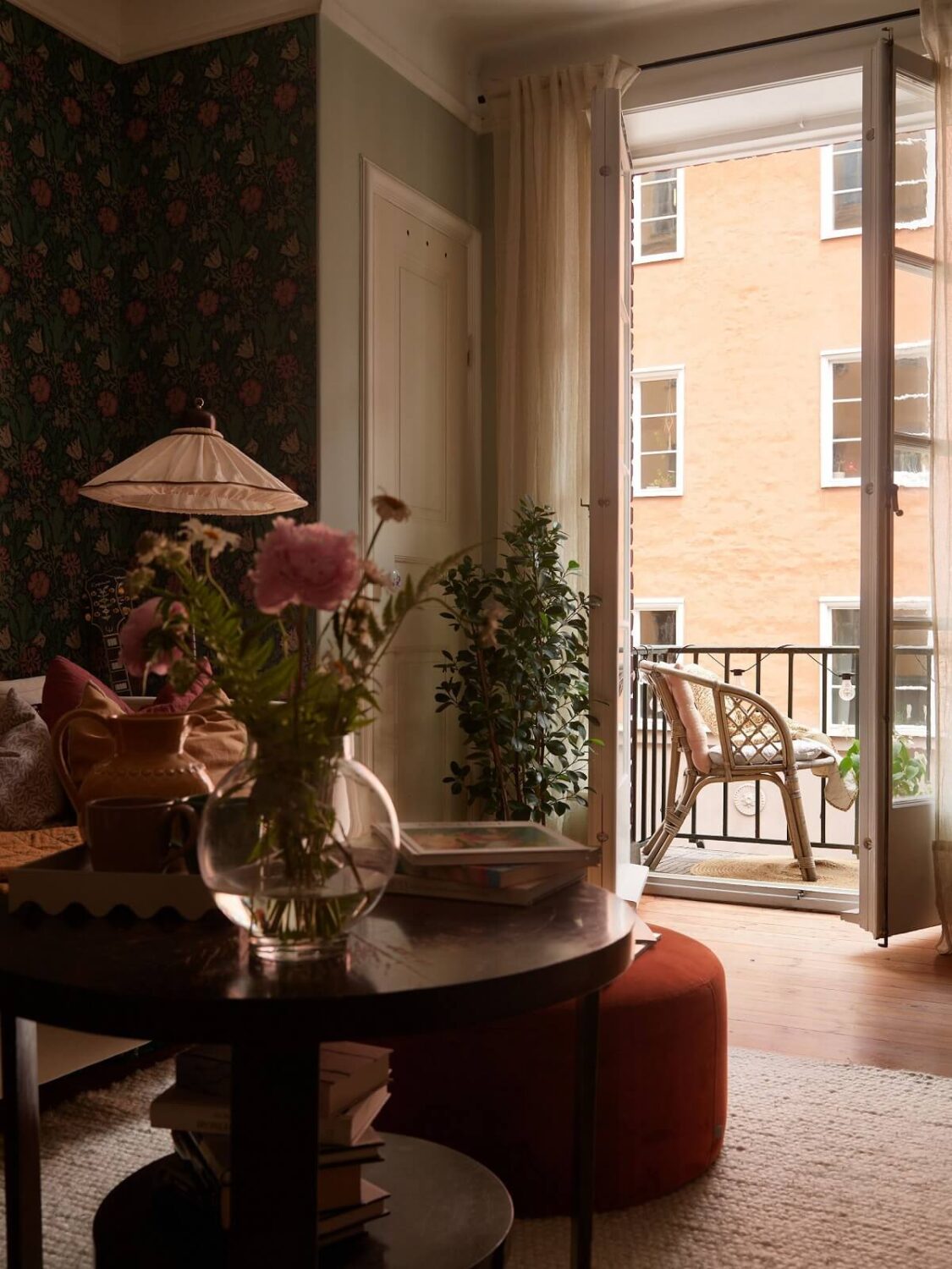 A Cozy 1920s Apartment with Original Details and Wallpaper 7 living room detail