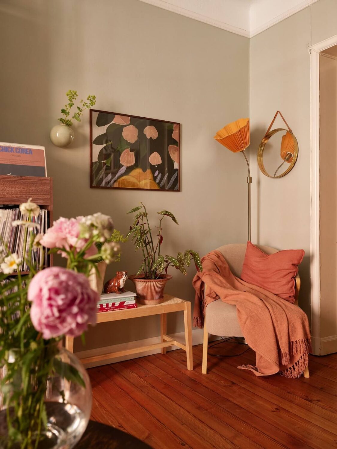 A Cozy 1920s Apartment with Original Details and Wallpaper 8 living room detail gray walls nordroom