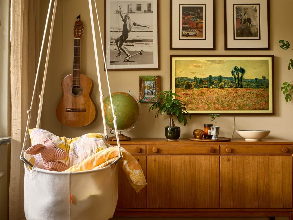 A Charming and Cozy Midcentury Family Apartment in Sweden 4 living room hanging baby cot nordroom