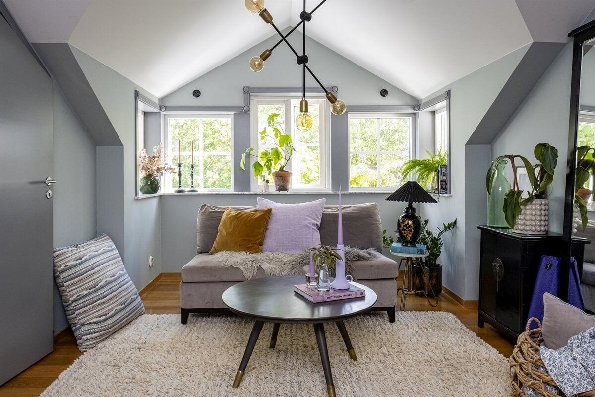 A White Swedish Villa with a Veranda and a Swimming Pool 17 living room pitched ceiling